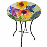 Teamson Home handpainted butterfly glass birdbath front view showing colorful design and stable stand