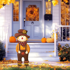 TERESA'S COLLECTIONS scarecrow placed in flowerbed, adds autumn charm outdoors
