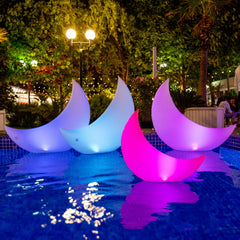 TIALLY front view of four crescent moon pool lights showcasing color options and shape, enhances pool mood