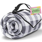 TigeJoy front folded blanket showing compact carry and organized strap convenience