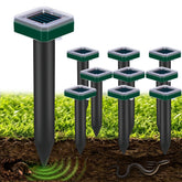 Tirgo front view of eight solar repellent stakes showing full kit protecting lawn