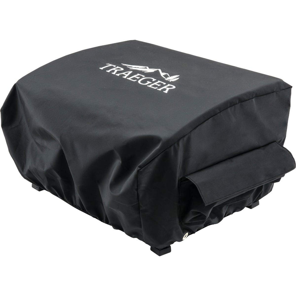 Traeger full-length cover on grill front view protects from weather and simplifies storage