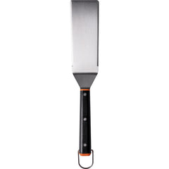 Traeger slotted spatula close-up showing slots that drain juices while lifting