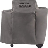 Traeger Ironwood 650 front view with full-length cover protecting finish