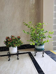 TREEZITEK stand holding heavy ceramic pot on patio demonstrates outdoor use benefit