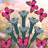 Tujoe front view of six pink butterfly stakes showing set and color, enhances garden appeal