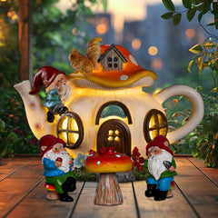 twinbling mushroom teapot front view showing whimsical house and gnome, adds charm