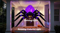 UHAVWILL inflatable spider in yard at night creating spooky ambiance
