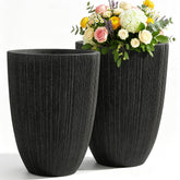 Ultym front view of black fluted planter showing elegant curb appeal