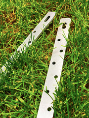 UniExtra stake driven into broken post showing quick in-place stabilization