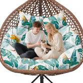 Uthem front view double egg cushion showing bright yellow leaf design and inviting comfort