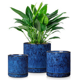 vancasso front view of three blue ceramic planters showing modern design and balance