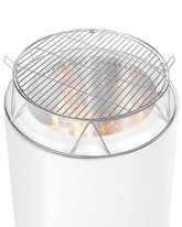 Vaticas front view showing assembled grate and stand, clear grilling benefit