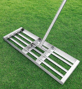 Veltec front view showing rake head and handle for efficient leveling