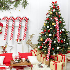Vinsot candy canes displayed in a storefront window to attract customers