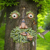 vomiceak front view showing resin tree face and feeder, adds garden personality