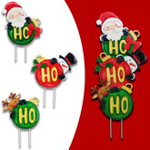 Voumsil front view of three metal Christmas stakes adding curb appeal