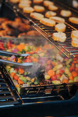 Weber basket installed in crafted grill demonstrating correct fit and versatile cooking benefit