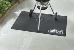 Weber floor protection mat under a gas grill catching ash and grease effectively