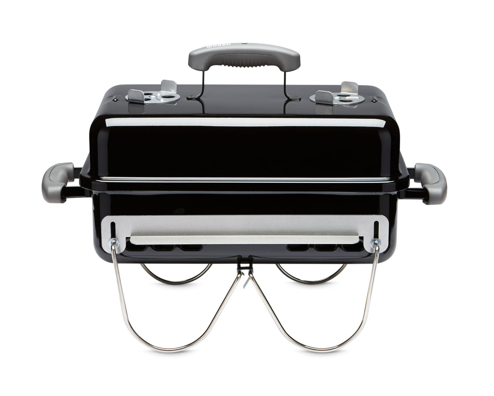 Weber front view of compact portable grill showing travel-ready design and convenience