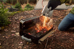 Weber close-up of open two-piece cooking grate showing easy fuel access and flexibility