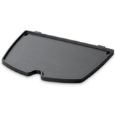 Weber Q griddle front view showing full cooking surface and benefit of versatile grilling