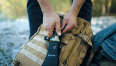 WEYLAND MOLLE sheath attached to backpack showing versatile carry benefit