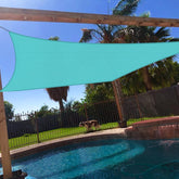 Windscreen4less turquoise shade sail front view showing vibrant color and coverage benefit