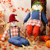 WinnerWhy front view of two sitting scarecrows showing welcoming fall decor