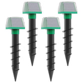 WNIGUCO front view of four solar mole repellent stakes showing garden protection