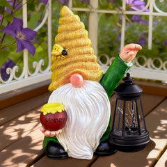 WONDHOME bee gnome lantern close-up highlighting solar panel and LED light