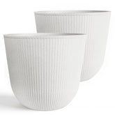 Worth Garden front view of two white planters showing clean curb appeal