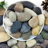 YISZM front of bag showing 40 lb natural river rocks for landscaping