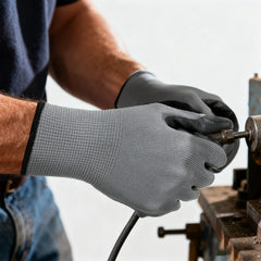YOUKE OLA gloves on hands using pruner demonstrating dexterity