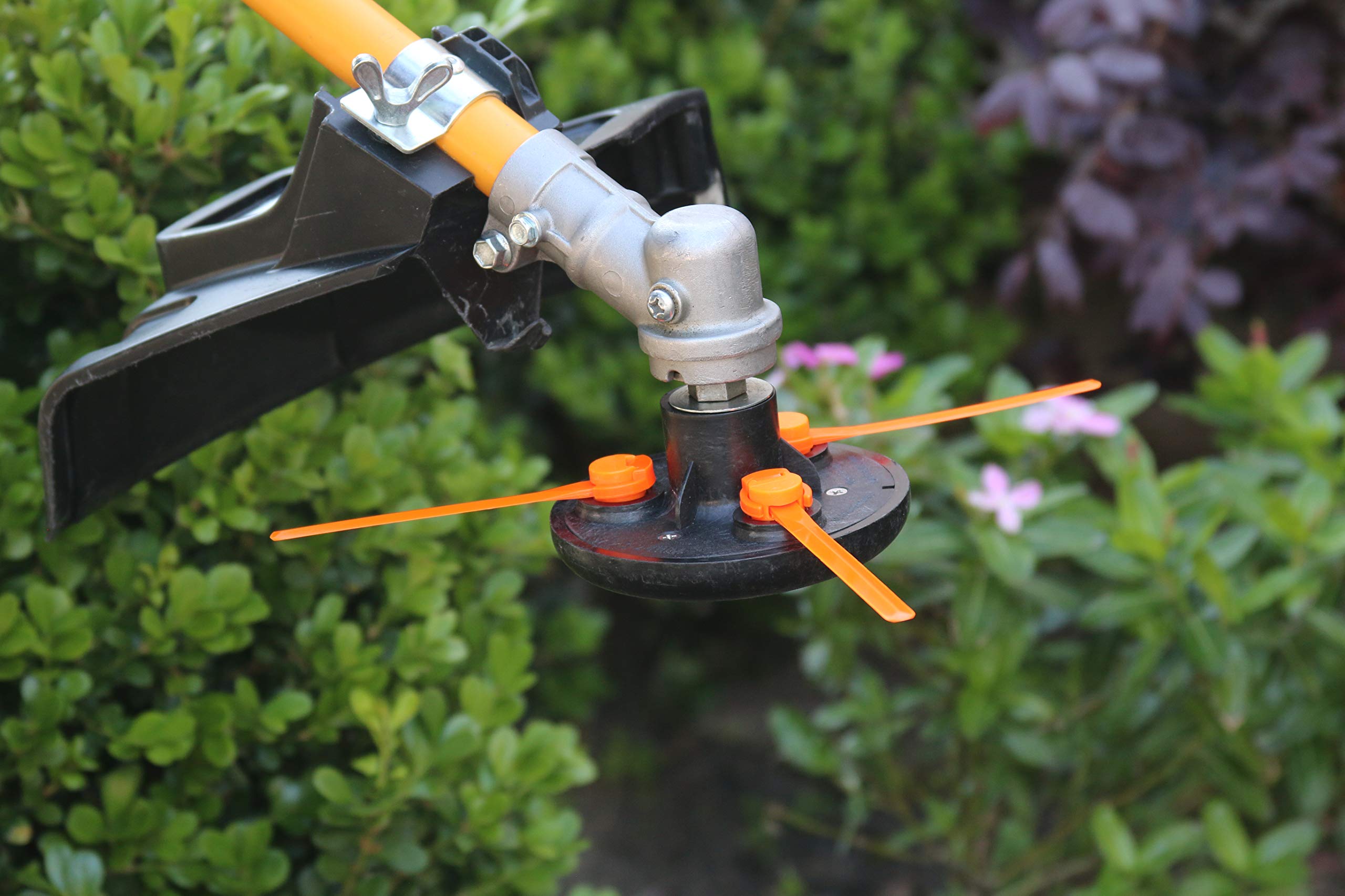 1-2-trim head installed on a gas trimmer demonstrating compatibility and immediate use benefit