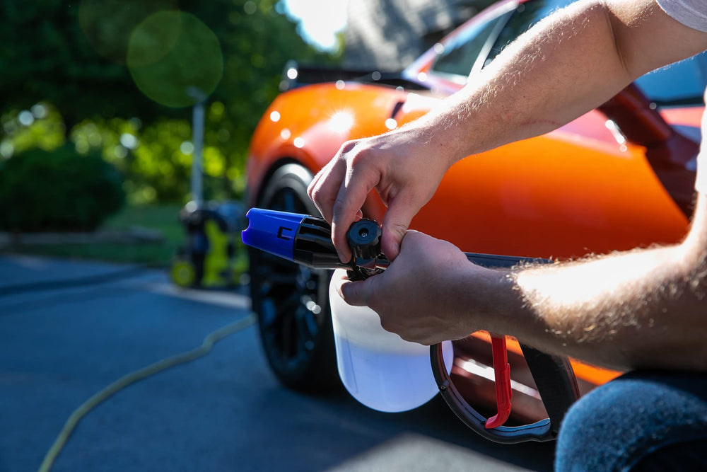 303 Products foam cannon spraying thick suds on a car for gentle effective cleaning