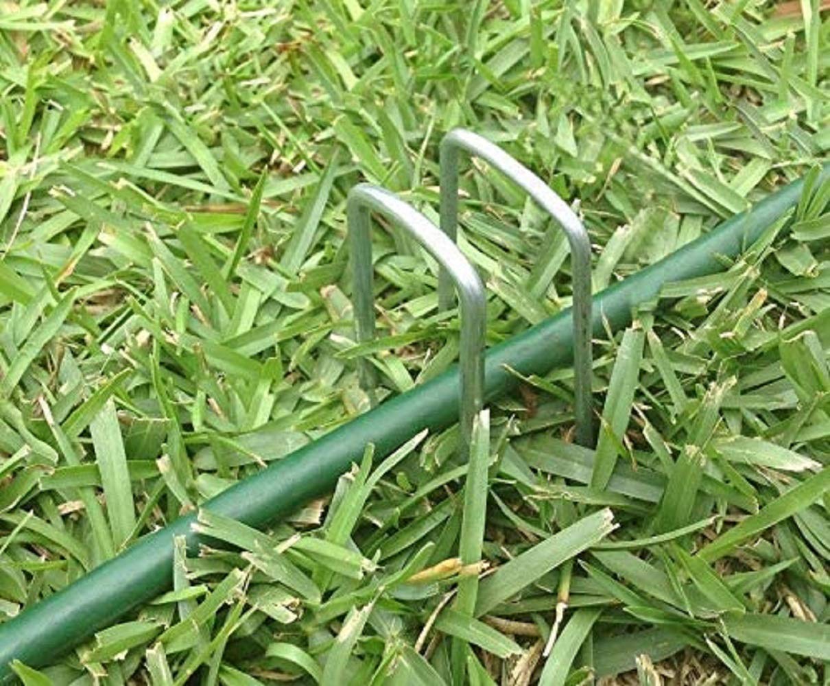 AAGUT staples holding garden bed netting in place for neat, secure landscaping