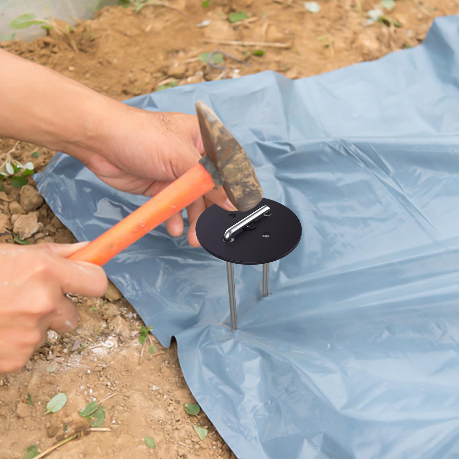 AAGUT staples holding drip irrigation lines in place to prevent movement