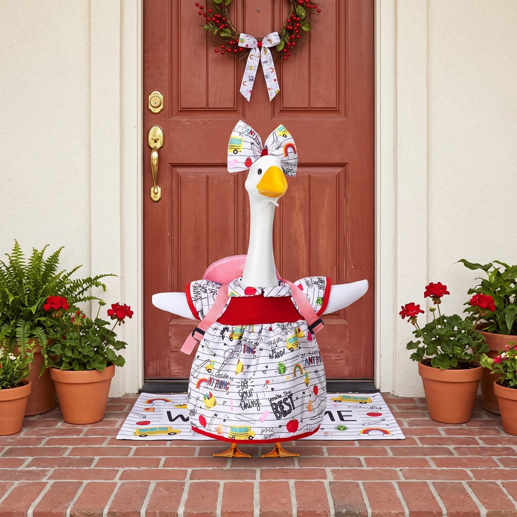 Abbylike goose next to ruler showing fit for 21 to 25 inch statues and sizing accuracy