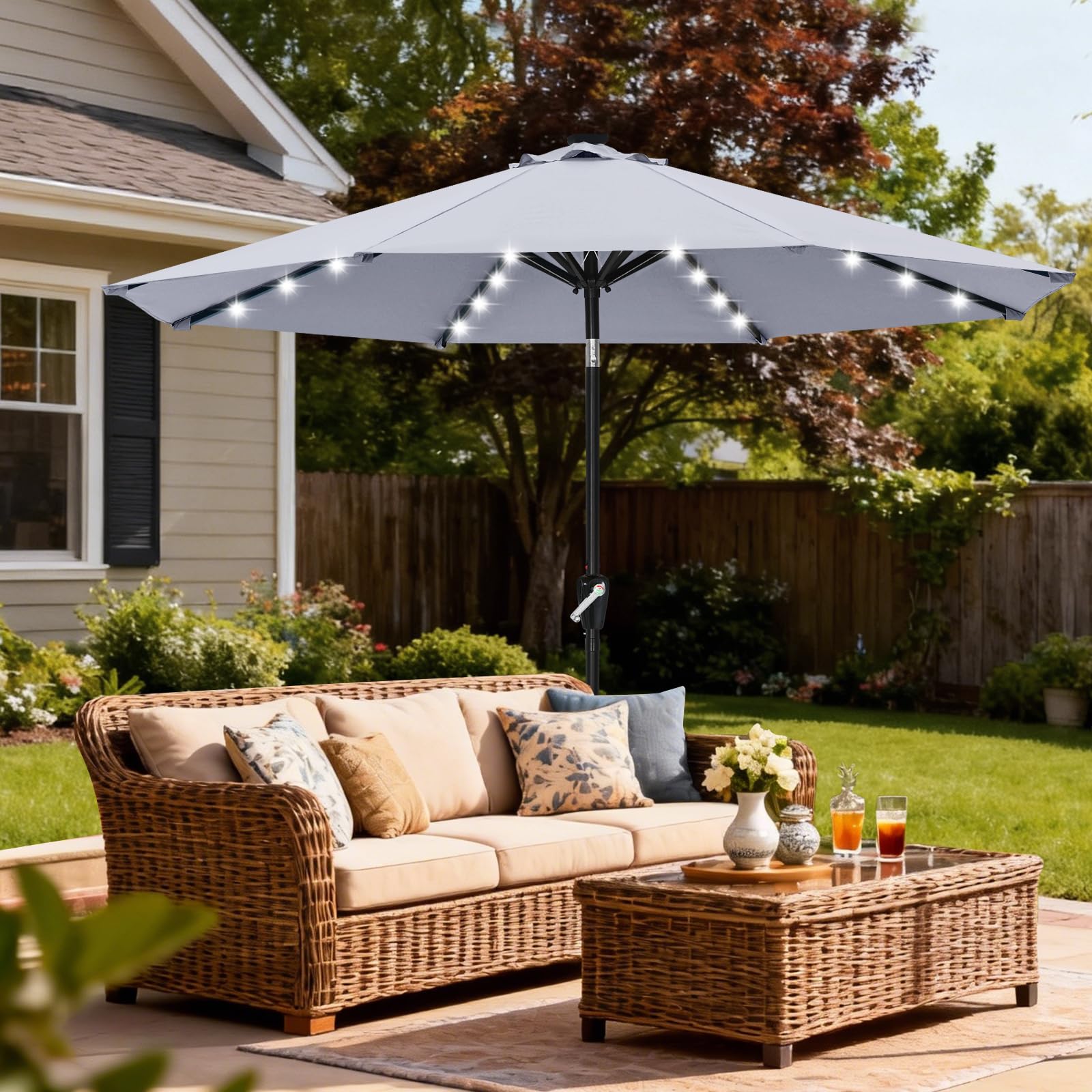 ABCCANOPY lit umbrella at dusk creating warm outdoor ambiance for dinners