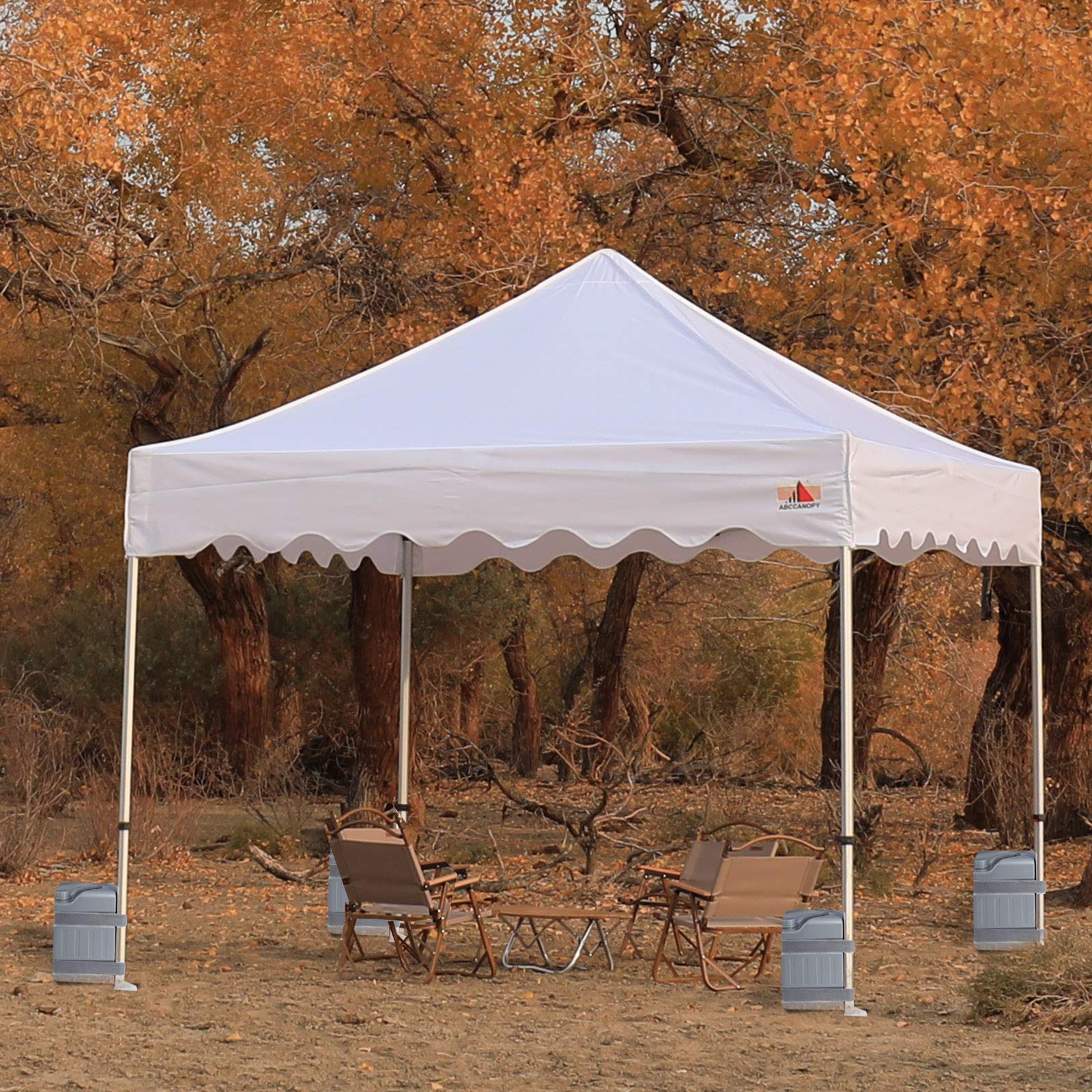ABCCANOPY weights attached to a pop-up canopy at a market for safe anchoring