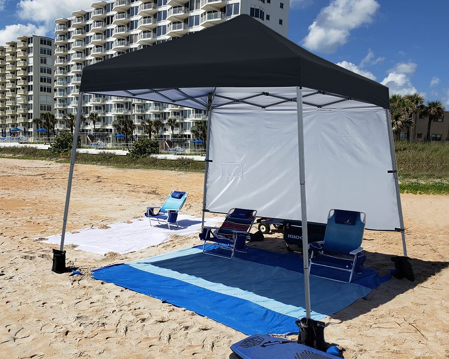 ABCCANOPY canopy set up on beach with people enjoying shade showing comfort benefit