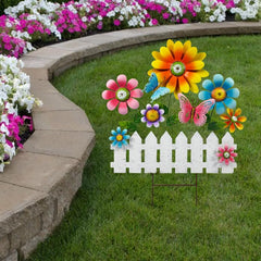 ABELOTS garden stake installed in flower bed, creates instant seasonal charm