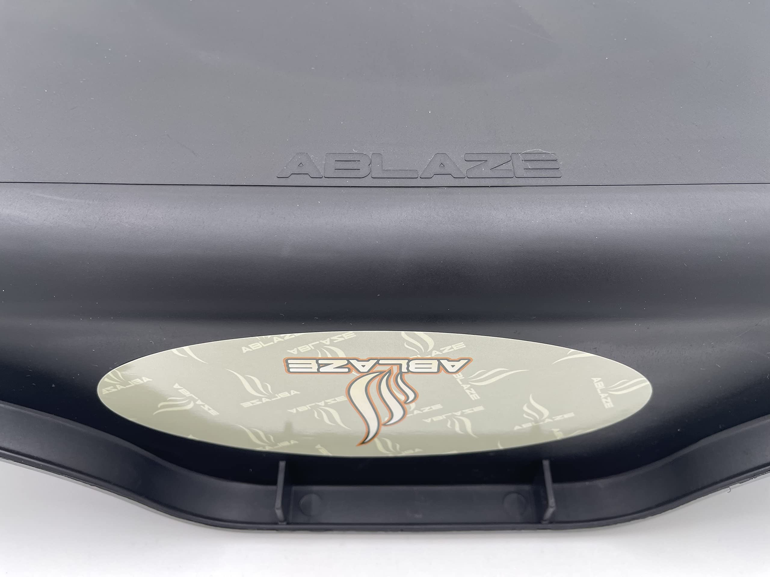 Ablaze tray held by hands showing dimensions and ergonomic handling benefit