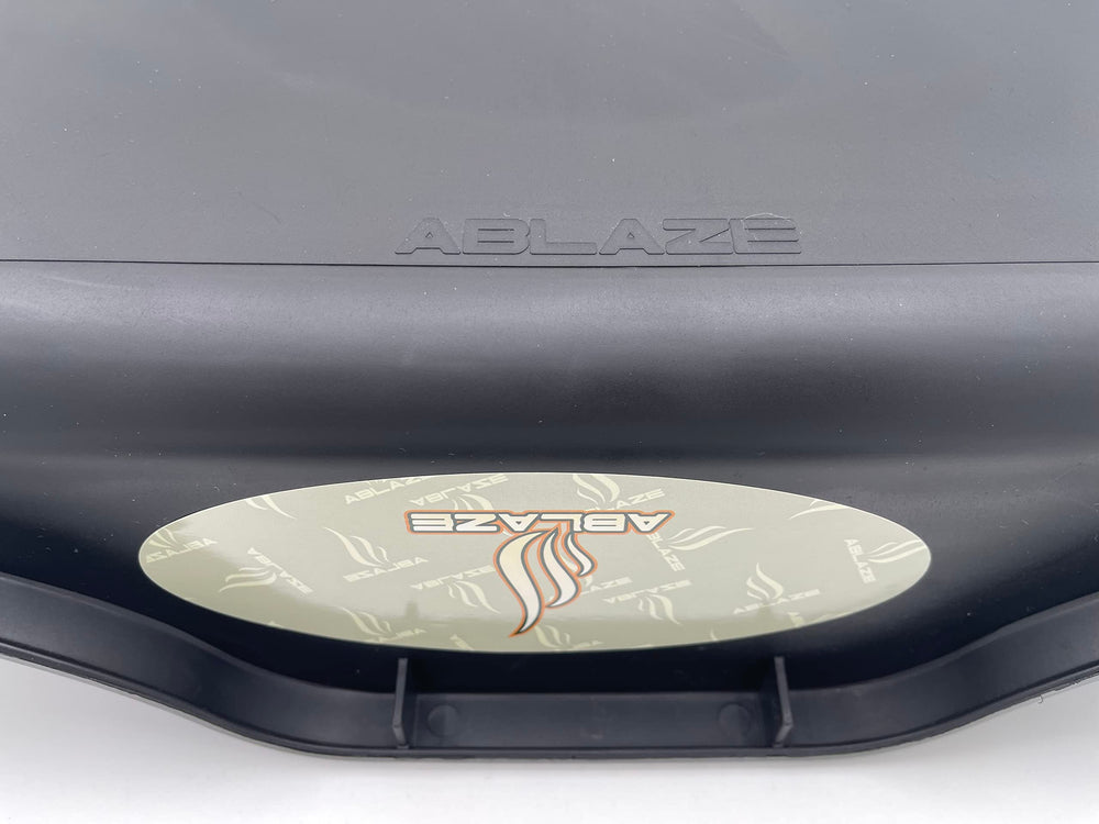 Ablaze tray held by hands showing dimensions and ergonomic handling benefit
