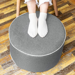AbunHeri front view gray ottoman showing durable shape and outdoor appeal