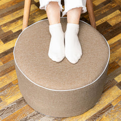 AbunHeri ottoman front view showing vibrant outdoor pouf and durable look