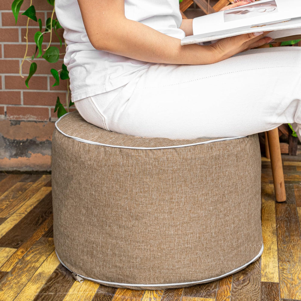 AbunHeri ottoman next to chair showing 20x20x12 inch scale benefits