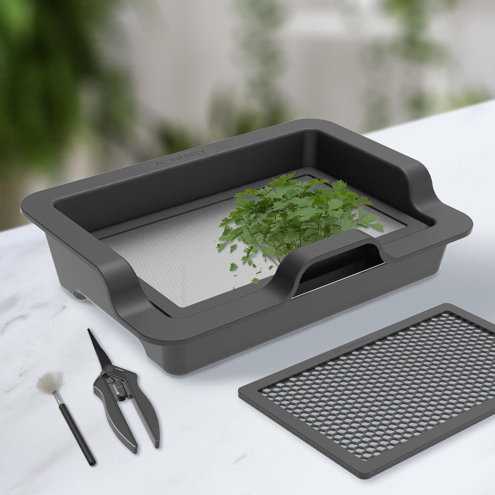 AC Infinity lifestyle tabletop setup showing tidy processing area and space‑saving design