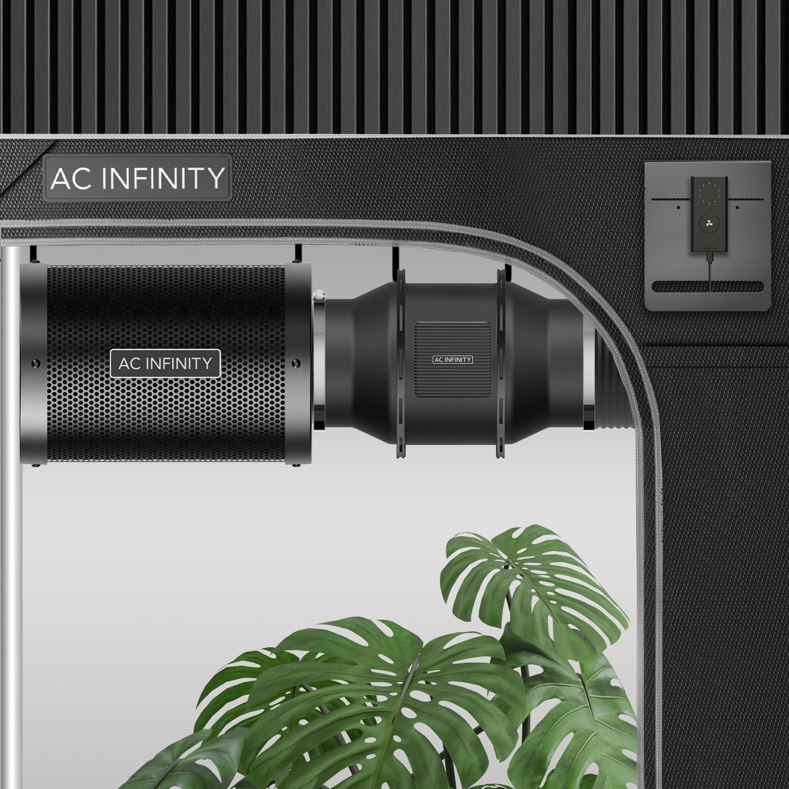 AC Infinity kit next to a hand for scale showing compact space-saving benefit